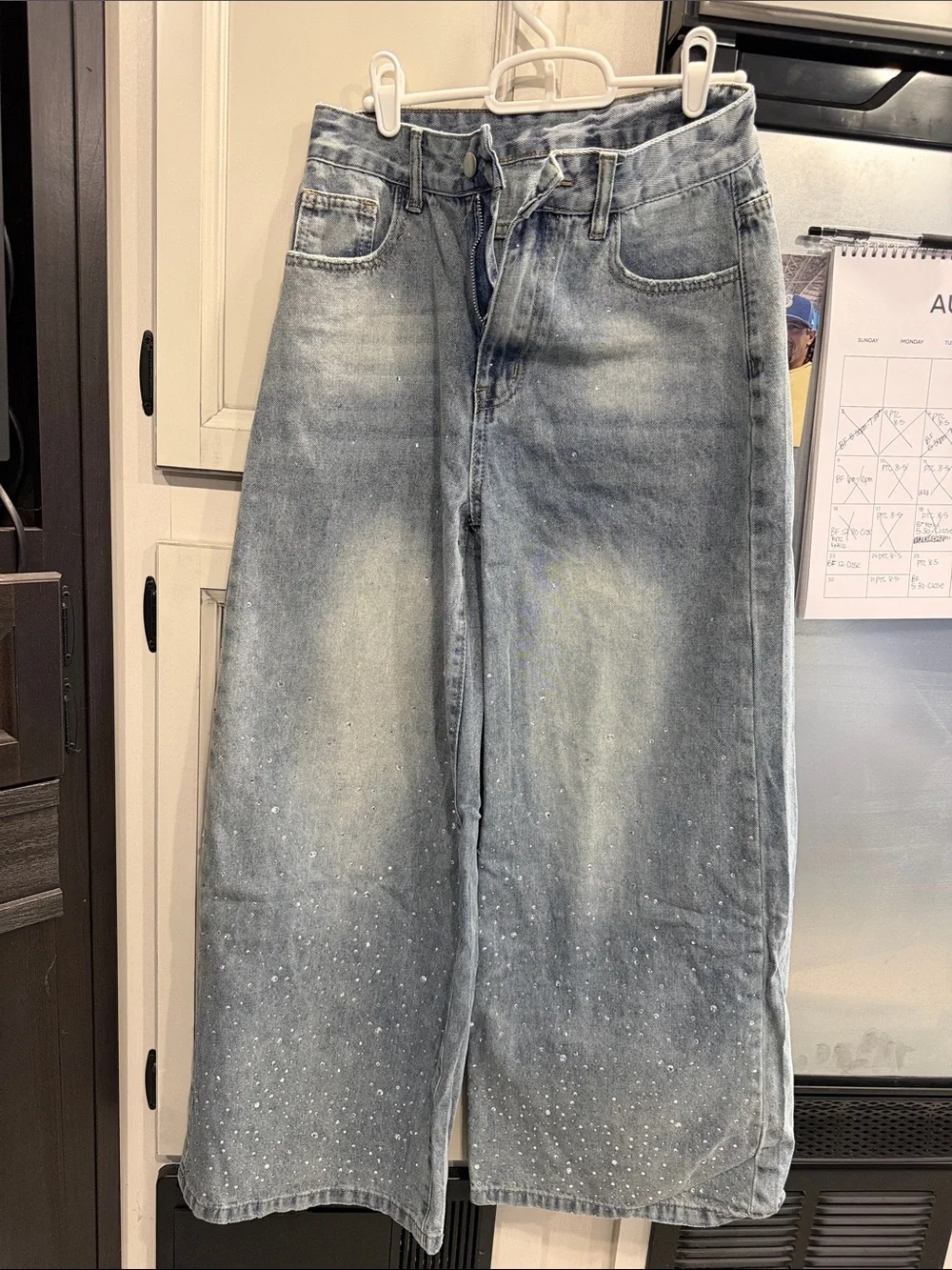 Wide-Leg Light Blue Women’s Jeans with Faded Finish & Rhinestones